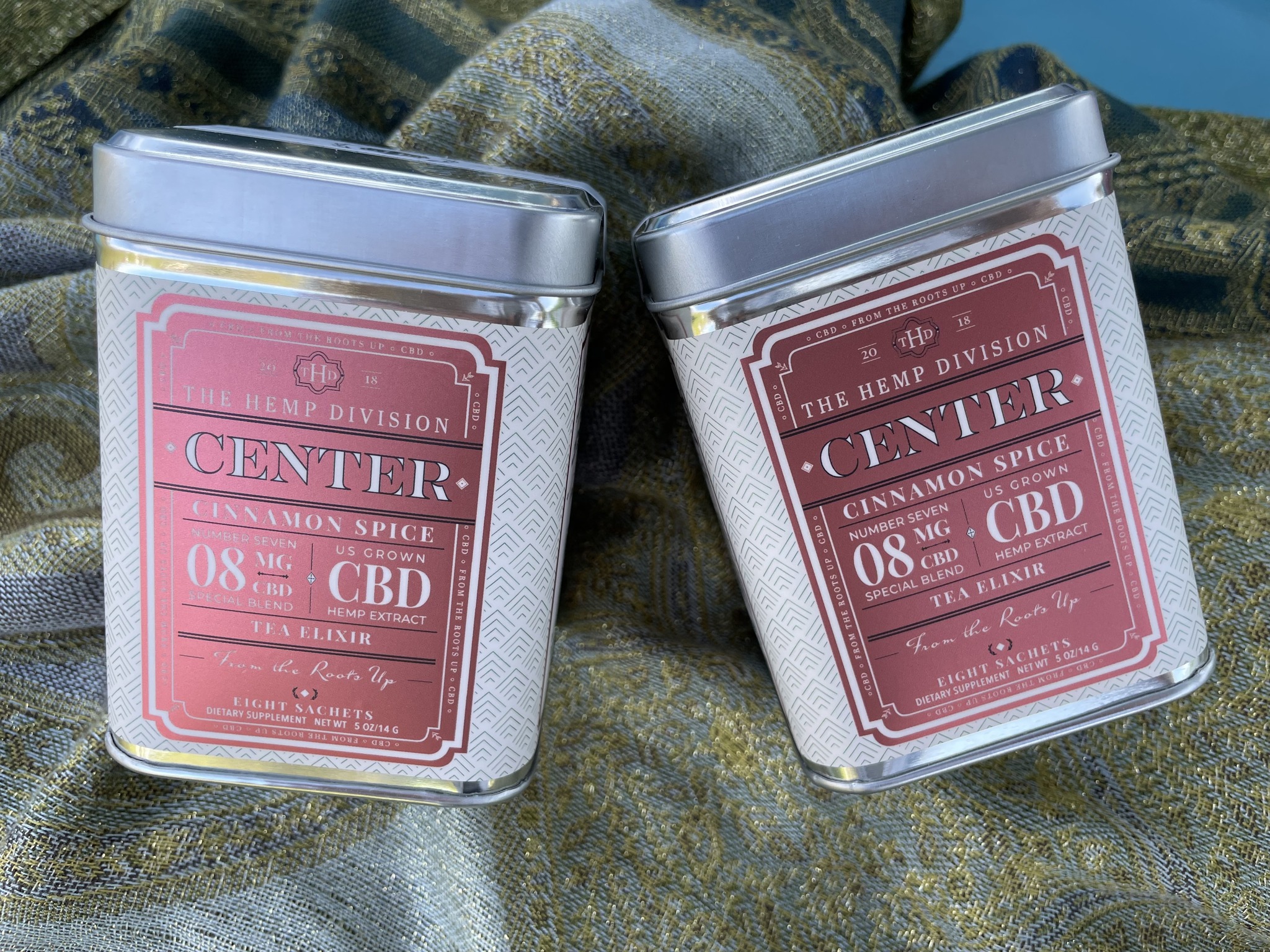 Two tins of CBD tea elixirs donation